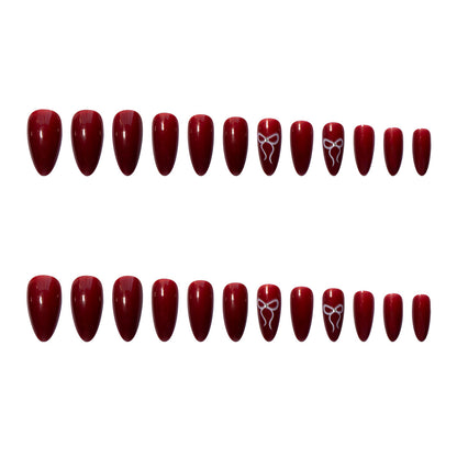 Kunstnagelset mit elegantem Bogen-Design Brehn