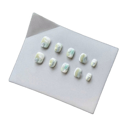 Künstlerisches Press-On-Nagelset mit glänzendem Marmor-Design
