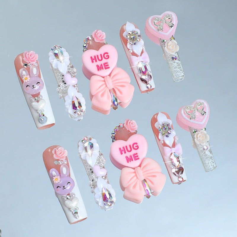 Kreatives Kunstnagelset mit verspielten Tier- und Herzmotiven Brehn