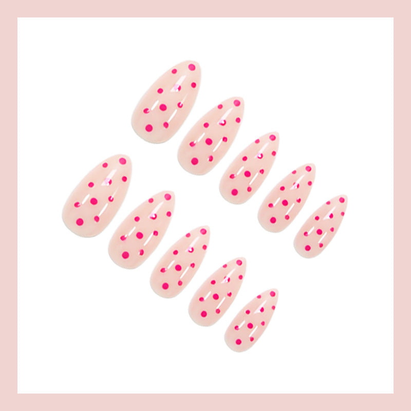 Kunstnagelset mit verspielten Punkten und elegantem Design Brehn