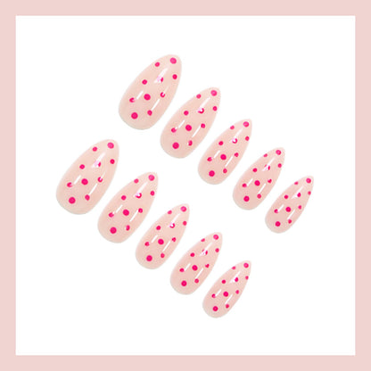 Kunstnagelset mit verspielten Punkten und elegantem Design Brehn