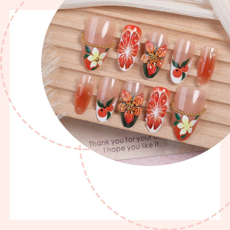 Kunstnagelset mit bunten Blumen- und Glitzerakzenten Brehn