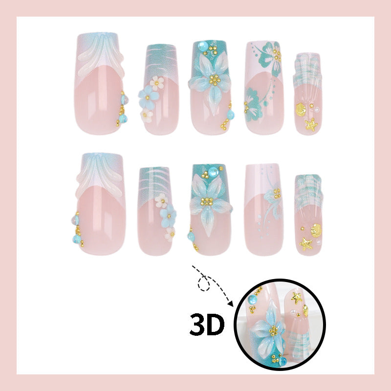 Kunstnagelset mit eleganten blumigen Verzierungen und Glitzerakzenten Brehn