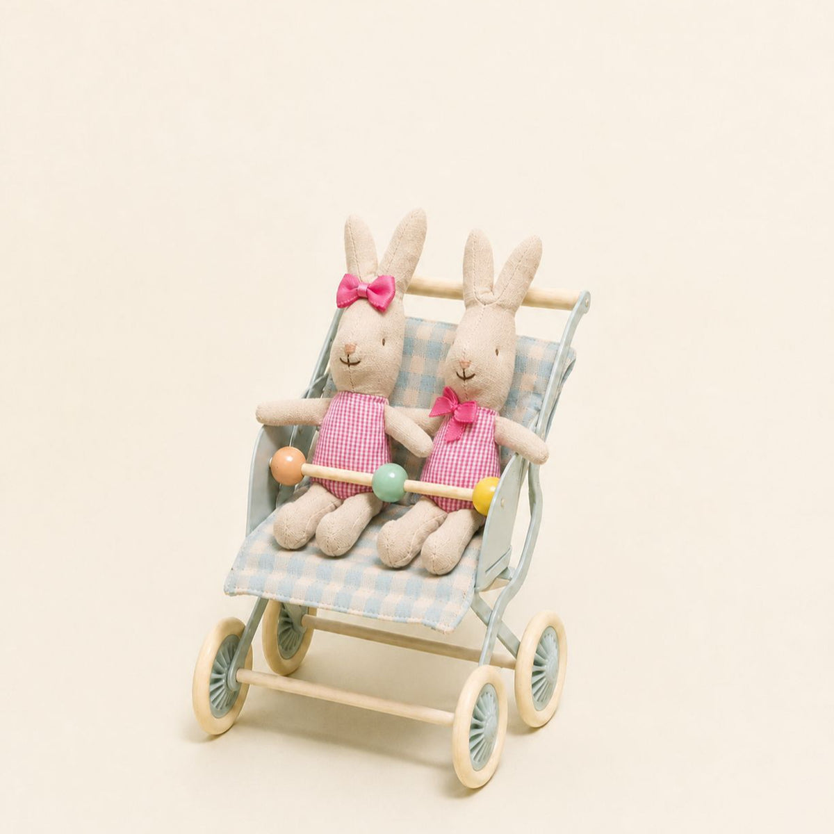 Weicher Leinenkaninchen-Kuschelpuppen mit rosa Gingham-Kleid und Satin-Schleife