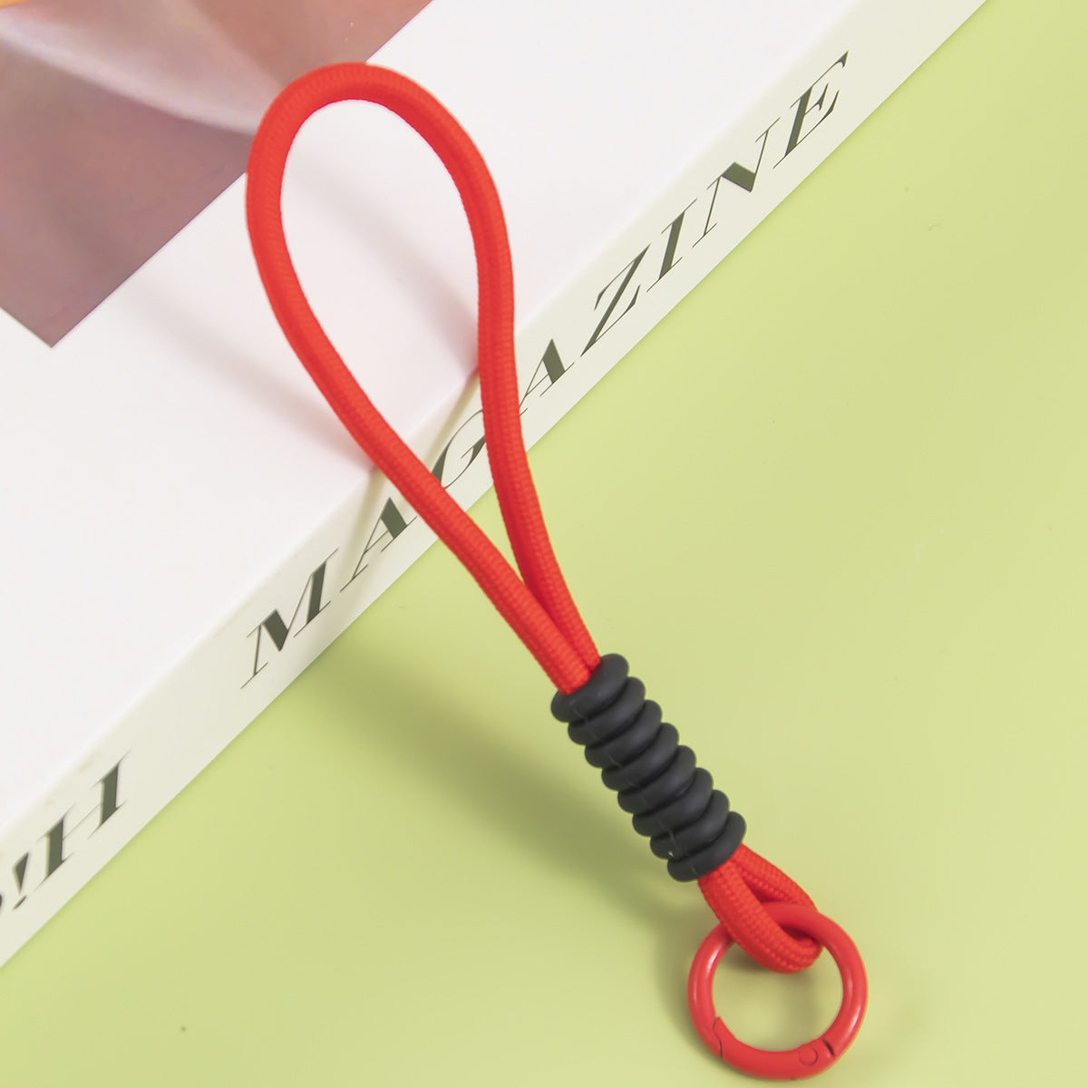 Vielseitiger elastischer Schlüsselringhalter Brehn