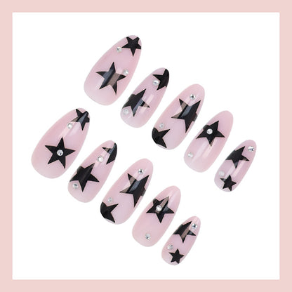 Kunstnagelset mit glamourösen Sternen und funkelnden Akzenten Brehn