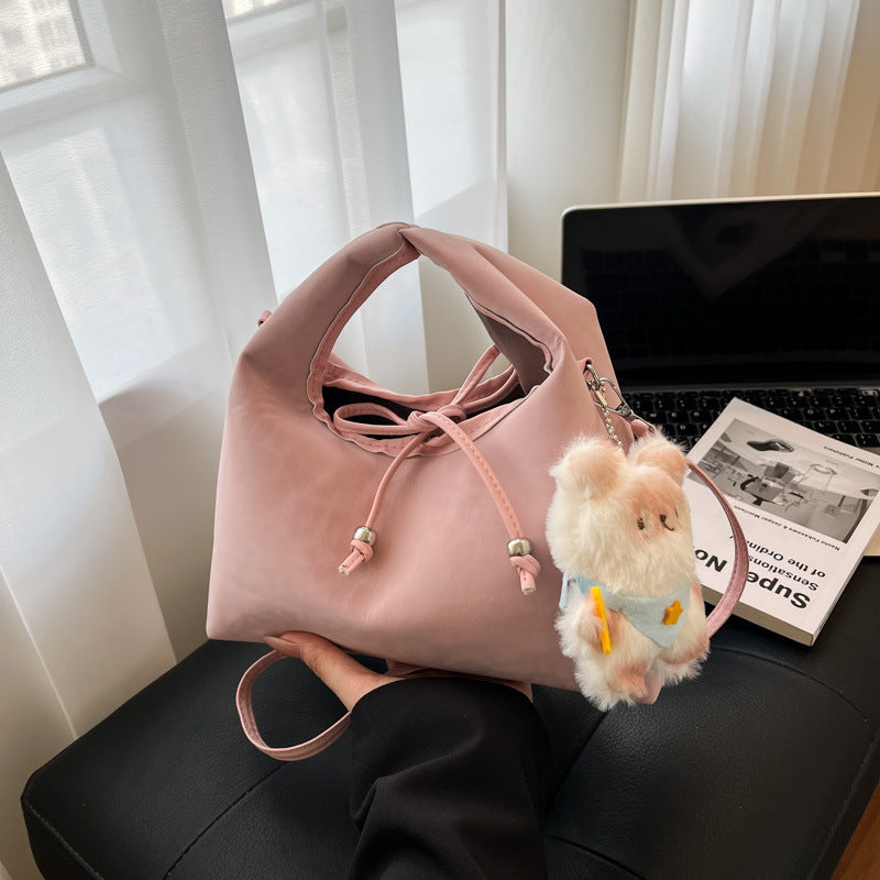 Stylische und funktionale Drawstring-Handtasche Brehn
