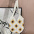 Handgefertigte Makramee-Tasche mit Sonnenblumenmuster Brehn