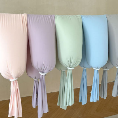 Ergonomisches Nackenstützkissen mit weichem Stretch‑Bezug und verstellbaren Knotenenden