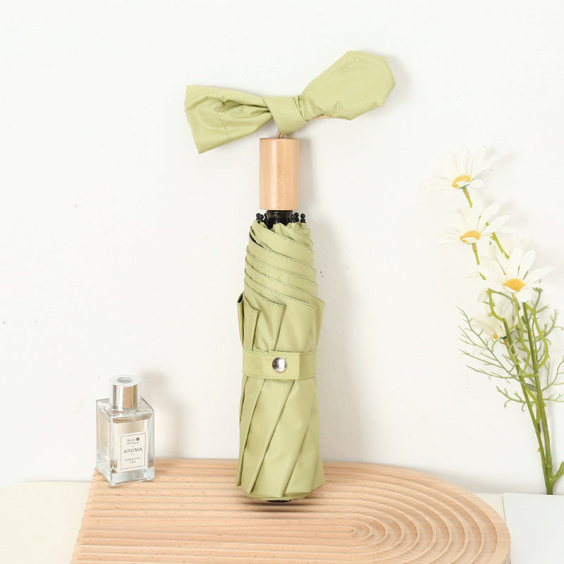 Damen kompakter Faltregenschirm mit elegantem Design und ergonomischem Holzgriff Brehn
