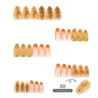 Künstlerisches Press-On-Nail-Set mit floralem und metallischem Design