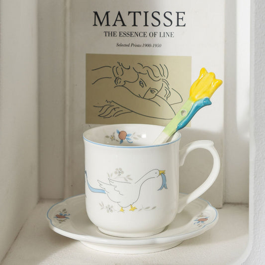Porzellan-Becher mit passender Untertasse und vintage Entenillustration