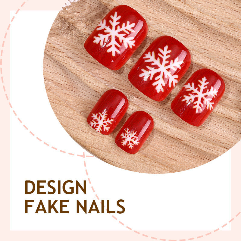 Kunstnagelset mit winterlichen Schneeflockenmotiven Brehn