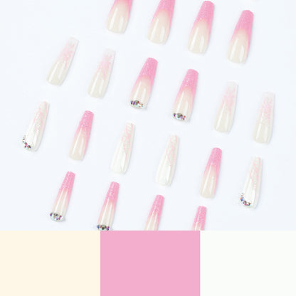 Kunstvolle Stiletto-Nägel mit Glitzer- und Schneeflockendesign Brehn