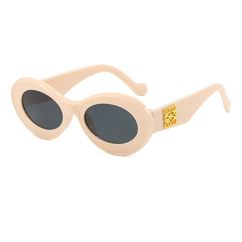 Damen modische Sonnenbrille mit ovalem Rahmen und goldenen Applikationen Brehn
