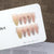 Elegantes Press-On Nail Art Set mit floralen Verzierungen Brehn
