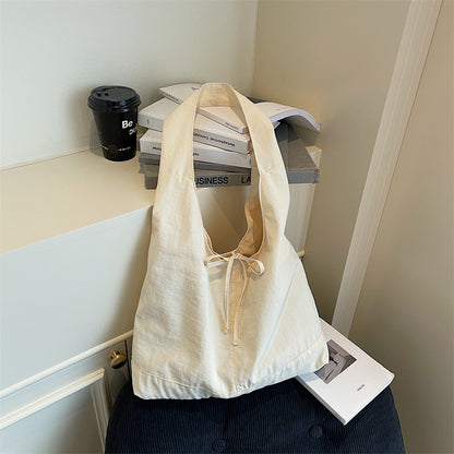 Lässiger verstellbarer Sling Tote