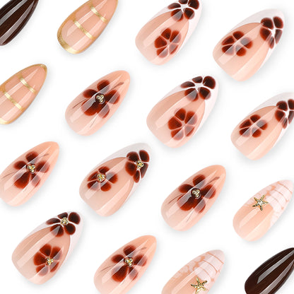 Kunstvolle Nagelkunst mit glamourösen Akzenten und eleganten Verzierungen Brehn