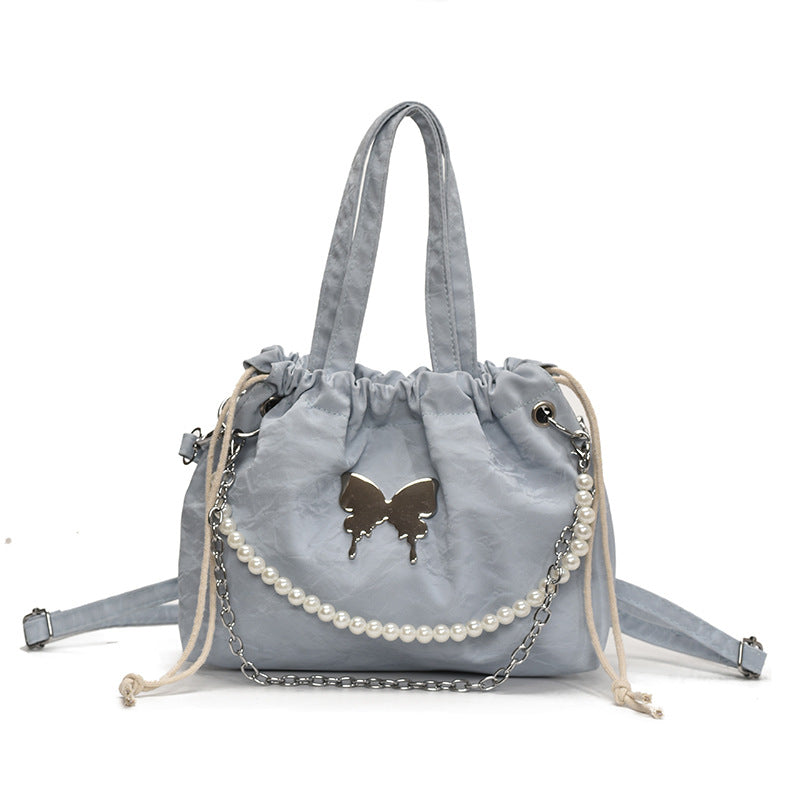 Elegante Mini-Handtasche mit Perlenakzenten und Kordelzug