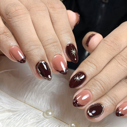 Kunstnagelset mit eleganten Farbverlauf und zarten Verzierungen Brehn