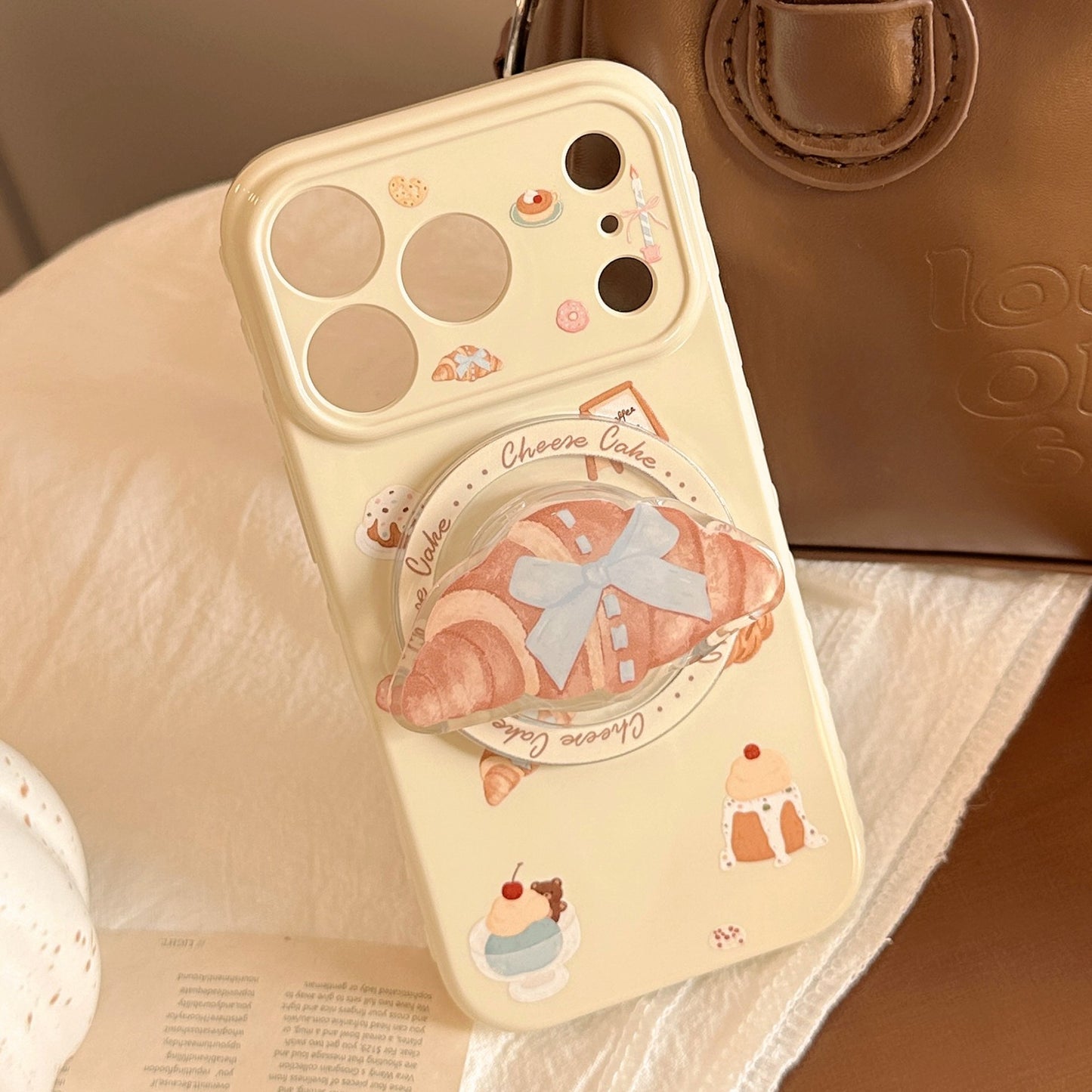 Smartphone Fingerhalter im Croissantdesign Brehn