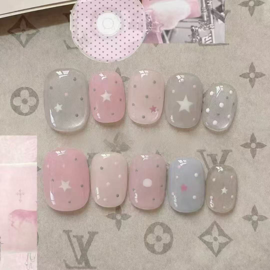 Elegantes Press-On-Nagelkunst-Set mit Schleife und Punkten Brehn