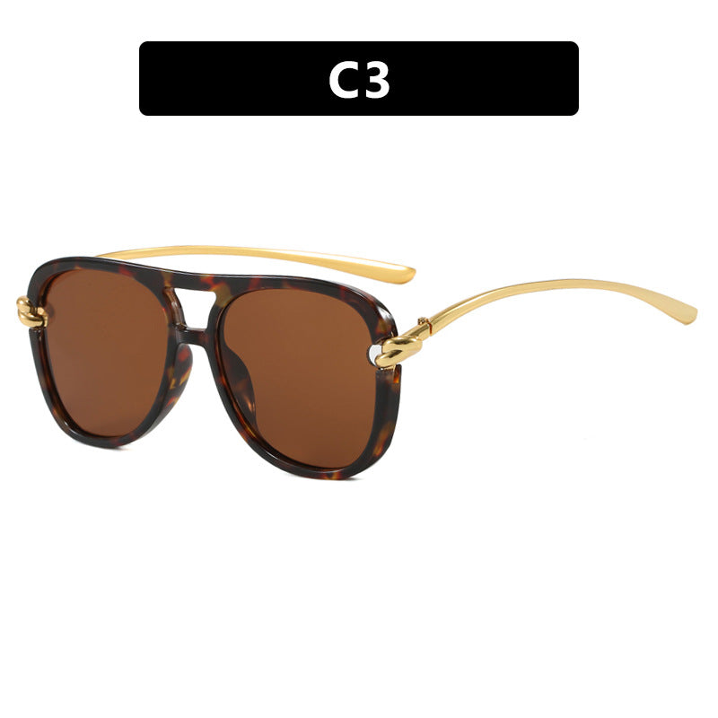 Damen sportliche Sonnenbrille mit breitem Kunststoffrahmen und UV-Schutz Brehn