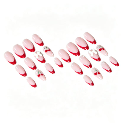 Künstlerisches Kirsch- und Schleifen-Nageldesign