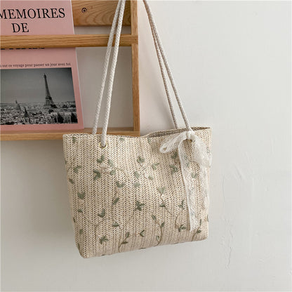 Woven Straw Strandtasche mit dekorativem Band