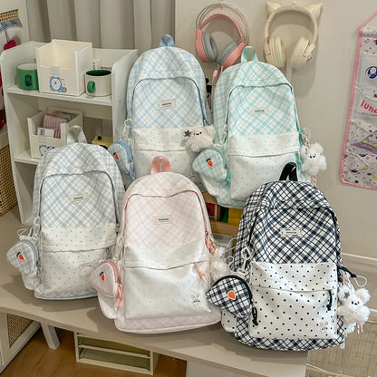 Stylische Karomuster-Rucksack mit lustigen dekorativen Akzenten Brehn