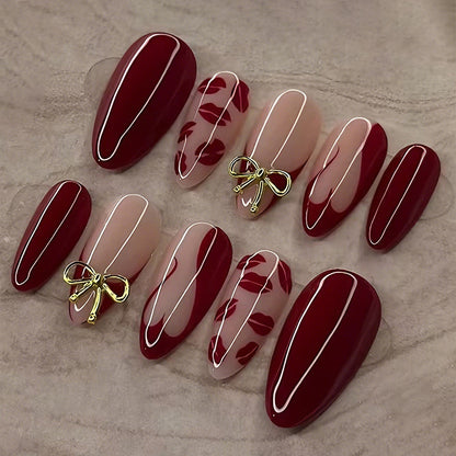 Kunstnagelset mit eleganten Schleifen- und Kussmund-Designs Brehn