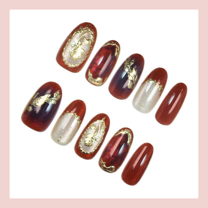 Kunstnagelset mit floralen und glamourösen Verzierungen Brehn