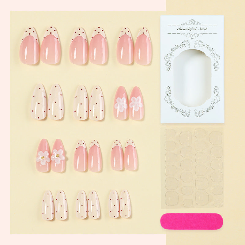 Elegantes Press-On Nail Set mit floralen und gepunkteten Designs Brehn
