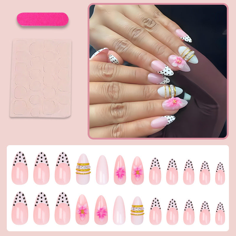 Kunstnagelset mit romantischen Blumenmotiven und eleganten Glitzerverzierungen Brehn