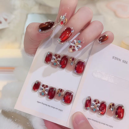 Elegantes mit Edelsteinen verziertes Press-On-Nagelset Brehn