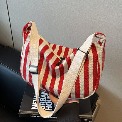 Lässige gestreifte Schultertasche