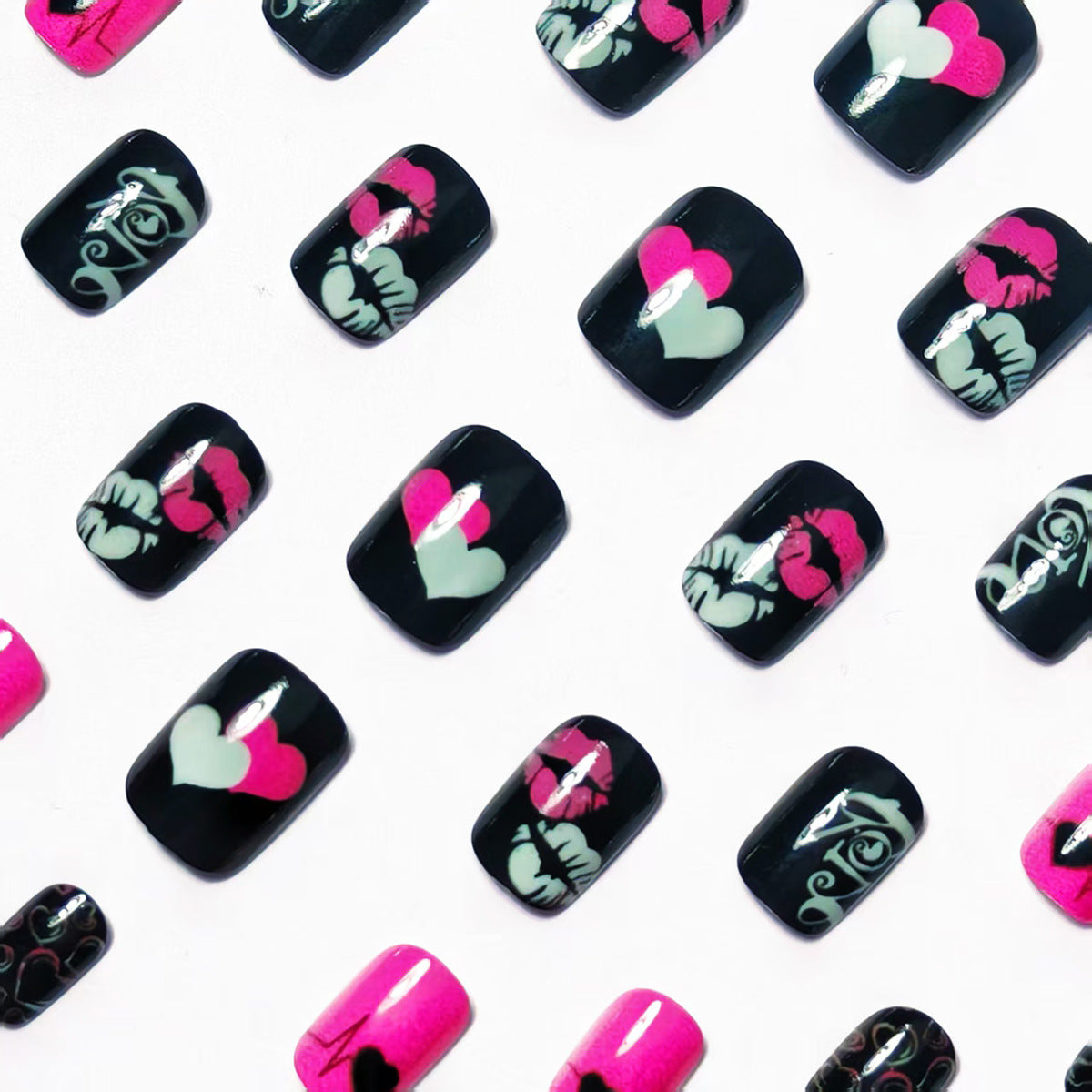 Kunstnageldesign mit Herzen und Kussmotiven Brehn