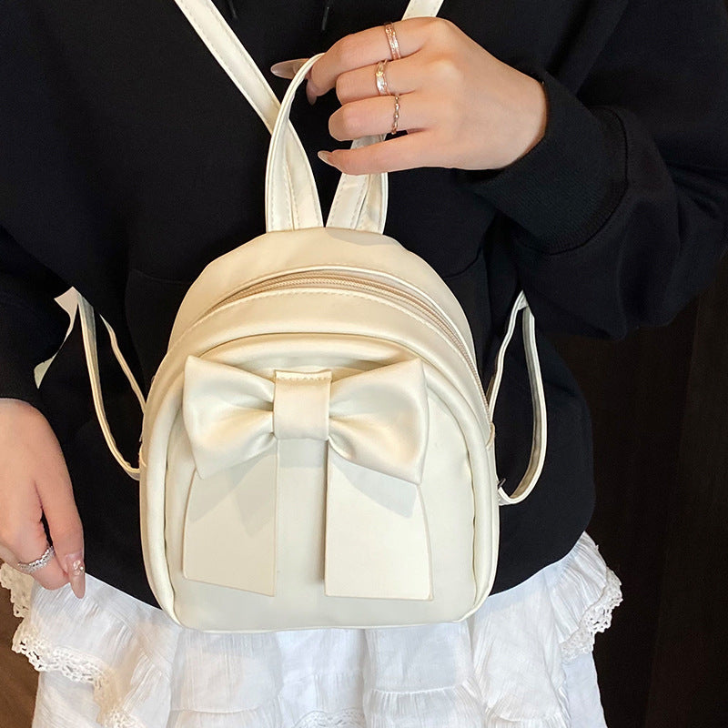 Bogenakzentierter Faux-Leder Mini-Rucksack
