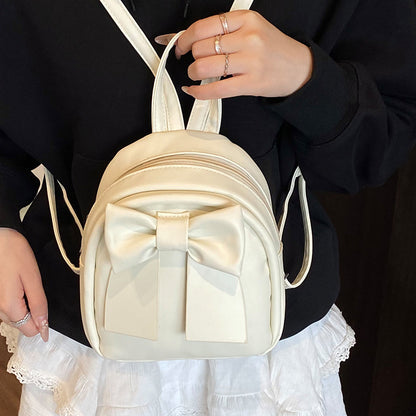 Bogenakzentierter Faux-Leder Mini-Rucksack