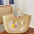 Stilvolle Basttasche mit Floralen Akzenten Brehn