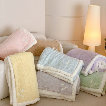 Kuschelige Sherpa-Tagesdecke mit wendbarem Fleece-Innenfutter