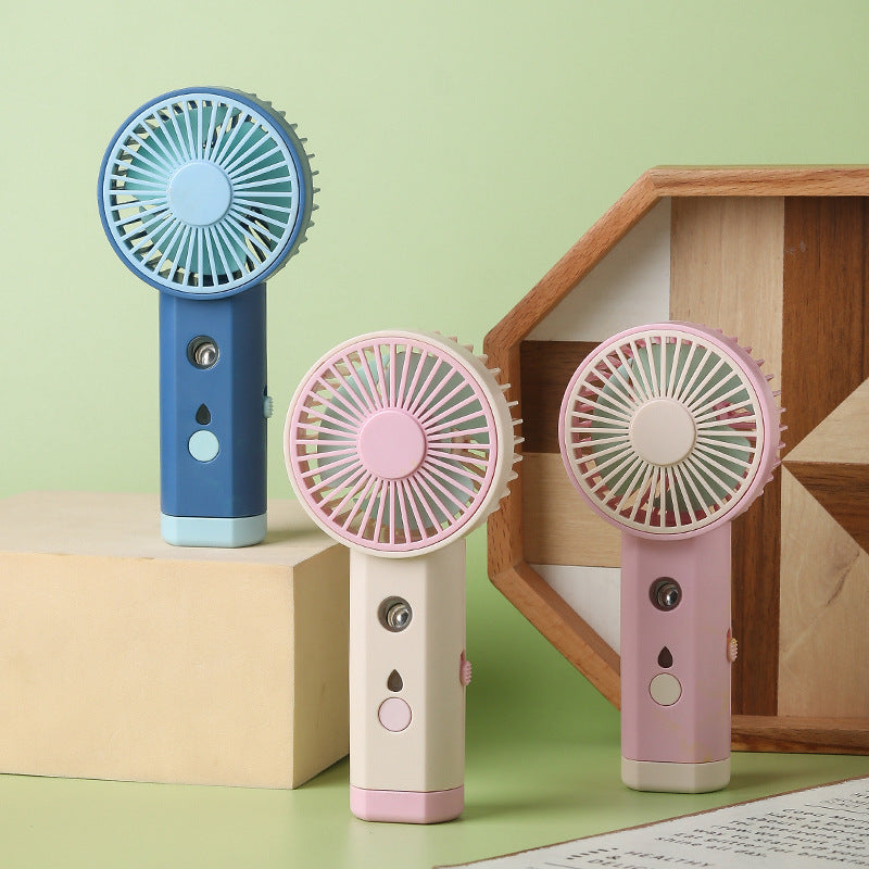 Kühlender tragbarer wiederaufladbarer Handheld-Mini-Ventilator mit einstellbarem Luftstrom, leisem Motor und USB-Ladefunktion Brehn