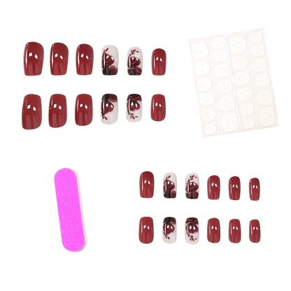 Detailliertes florales Nagelkunst-Set Brehn
