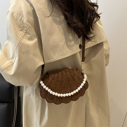 Elegante muschelförmige Umhängetasche Brehn
