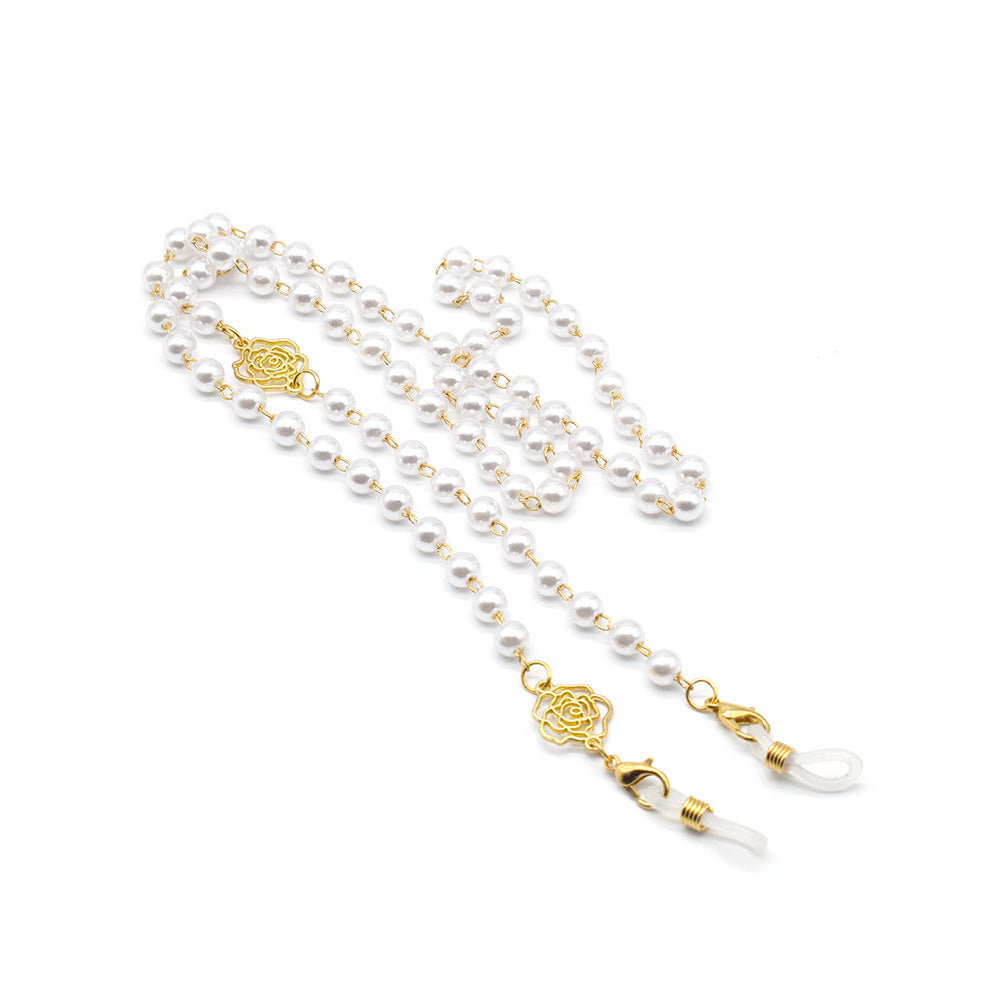Elegante Brillekette mit Perlen und Goldakzenten Brehn