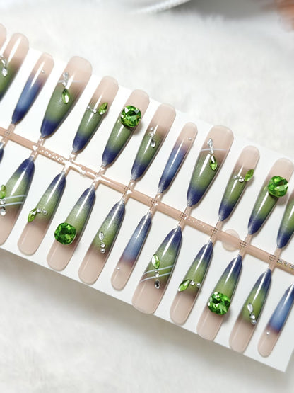 Kunstnägel mit elegantem Farbverlauf und Glitzerakzenten Brehn