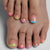 Kreatives Nagelset mit bunten Kunstnägeln Brehn