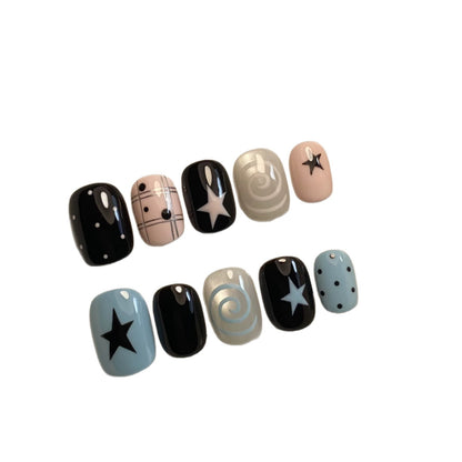 Dekoratives Press-On Nagelkunstset mit Stern- und Wirbel-Designs