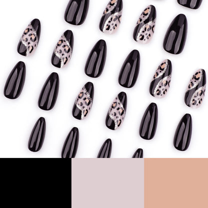 Kunstvolle Stiletto-Nägel mit leopardischem Design und Glitzereffekten Brehn