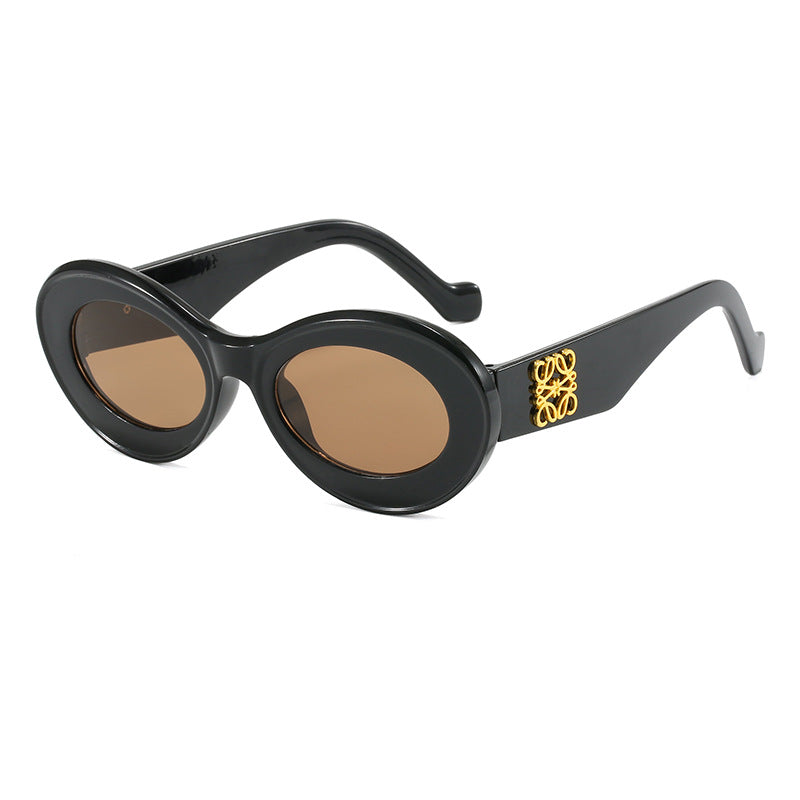 Damen modische Sonnenbrille mit ovalem Rahmen und goldenen Applikationen Brehn